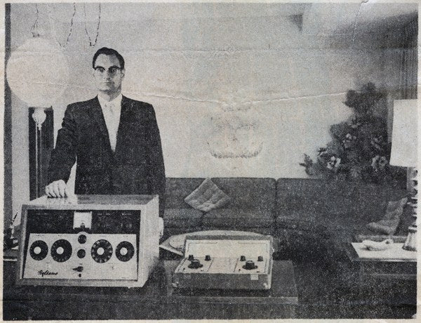 Marvin Posey operating an early audiometer at the family hearing practice, Central Valley California, 1950s